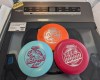 Disc golf discs at Beacon Services & Appliances.